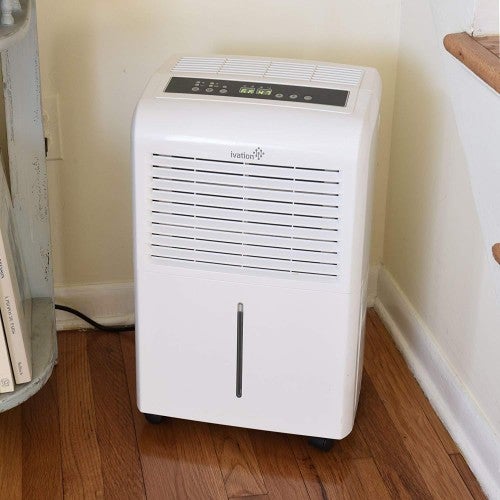 30-pint Energy Star-certified Ivation dehumidifier - includes programmable humidistate, hose connector, automatic switch off / restart, timer, wheels and air-washable filter.